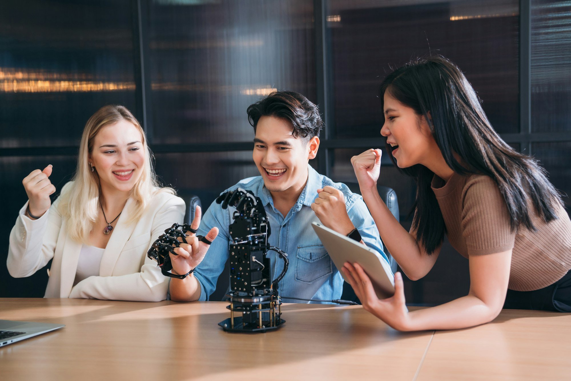 College Students research inventions robotics and robot arm. Experiments and digital automation. College Students research inventions robotics and robot arm. Experiments and digital automation.